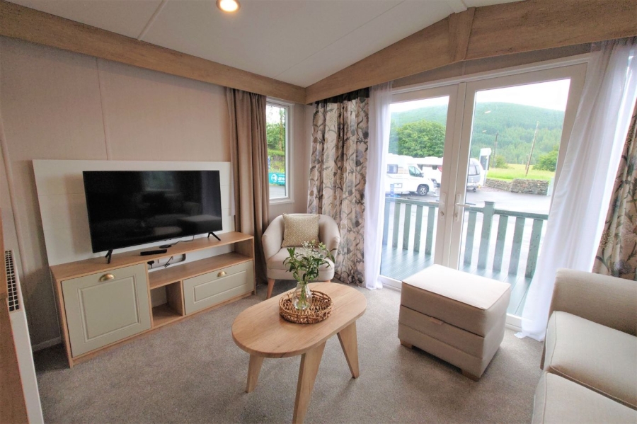 swift moselle caravan holiday home for sale - lounge area